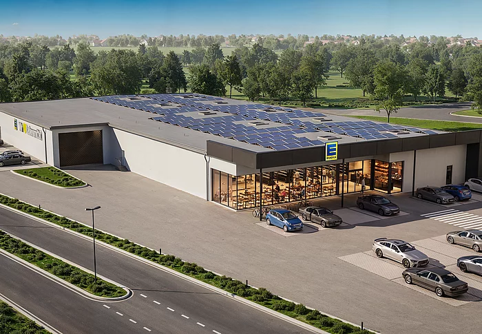 Visualisierung eines modernen EDEKA-Marktes mit großflächiger Photovoltaikanlage auf dem Dach, vorgelagertem Parkplatz, Cafébereich mit Glasfassade sowie einem separaten Getränkemarkt auf dem Gelände an der Regensburger Straße in Teublitz.